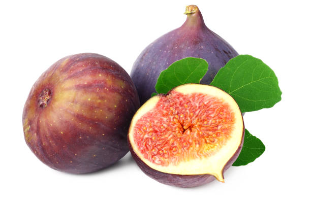 istock Fig fruits with green leaf and slices isolated on white background 1211295749