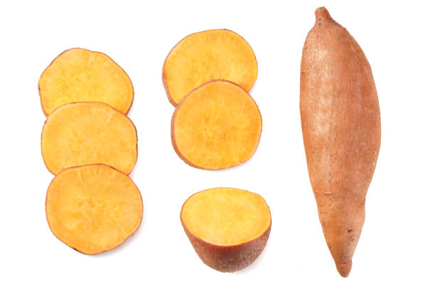 istock sliced sweet potatoes isolated on white background. top view 1211295752