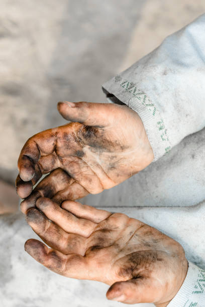 dirty hands and clothes of a child dirty hands and clothes of a child child labor stock pictures, royalty-free photos & images
