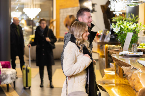 istock tourists in hotel lobby and reception 1211300107