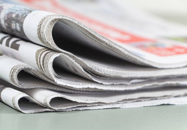 istock Pile of newspapers 1211301894