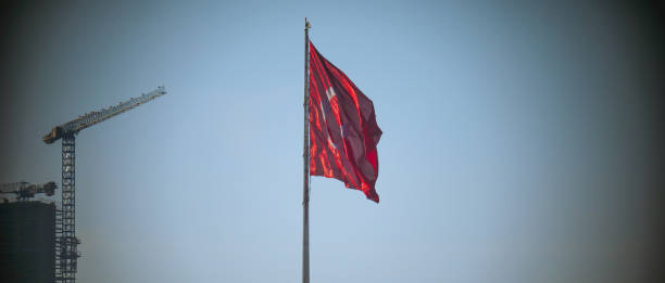 istock Turkish Flag waving front of Construction Crane. 1211303185