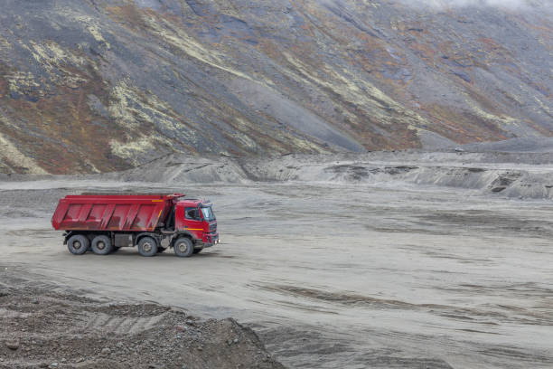 istock Construction machinery works on quarry mining in the Khibiny mountains, Kola Peninsula 1211303939
