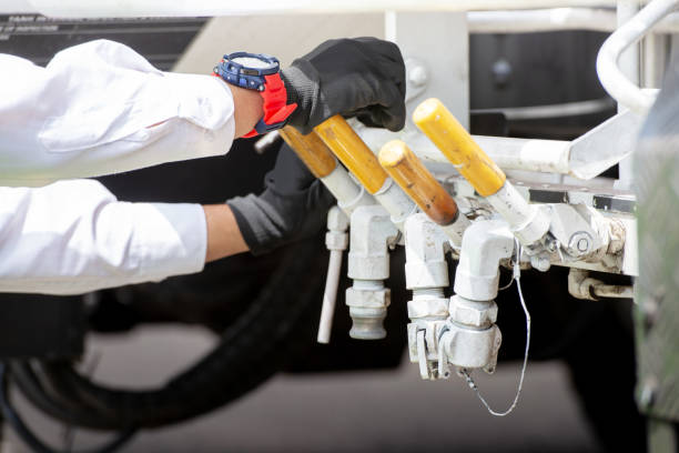 istock Safety officer set the fuel tap 1211304213