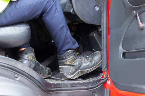 istock Truck driver behind the steering wheel 1211305336