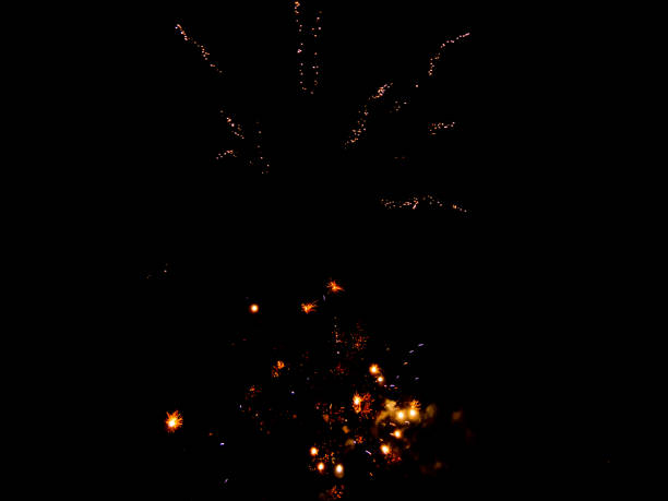 istock Colorful fireworks on the black sky background. 1211305596