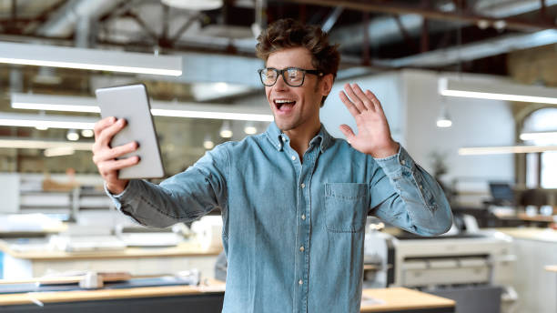 Give more than expected. Young businessman posing in office