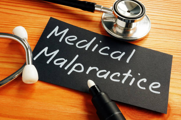 istock Business photo shows hand written text Medical Malpractice 1211307611