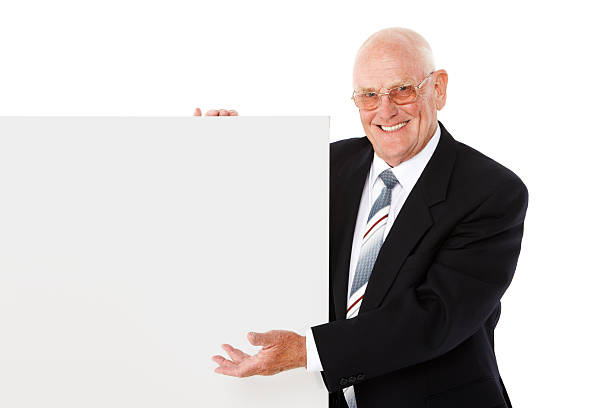 istock Businessman Presenting a Blank Sign - Isolated 121130829