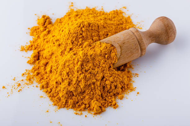 istock natural turmeric powder on white acrylic background 1211310560