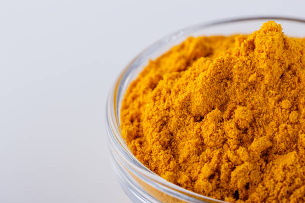 istock natural turmeric powder on white acrylic background 1211310637