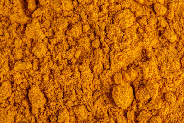 istock natural turmeric powder on a dark stone background 1211311012