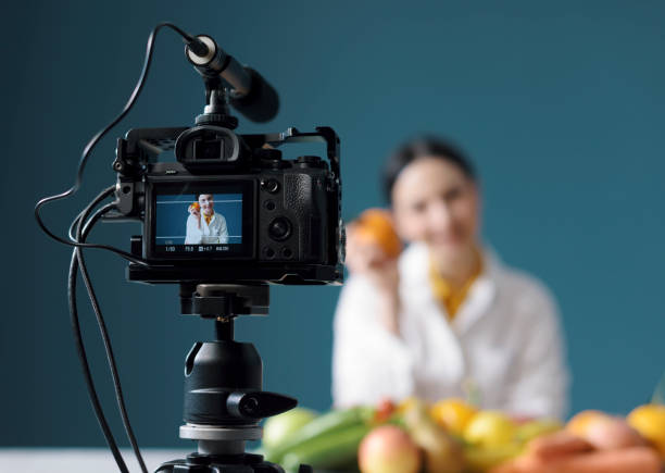 istock Professional nutritionist making a video blog 1211311084