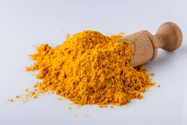 istock natural turmeric powder on white acrylic background 1211311087