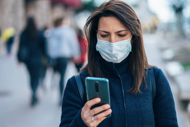 istock Woman with face protective mask 1211311813