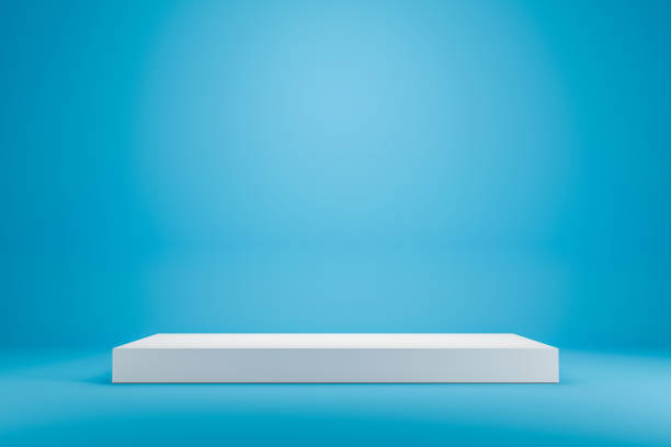 White podium shelf or empty studio display on vivid blue summer background with minimal style. Blank stand for showing product. 3D rendering. White podium shelf or empty studio display on vivid blue summer background with minimal style. Blank stand for showing product. 3D rendering. base sports equipment stock pictures, royalty-free photos & images