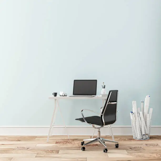 Workdesk with decoration on hardwood floor in front of empty light blue wall with copy space. 3D rendered image.