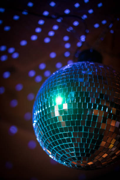istock Shiny disco ball in a night club 1211314837