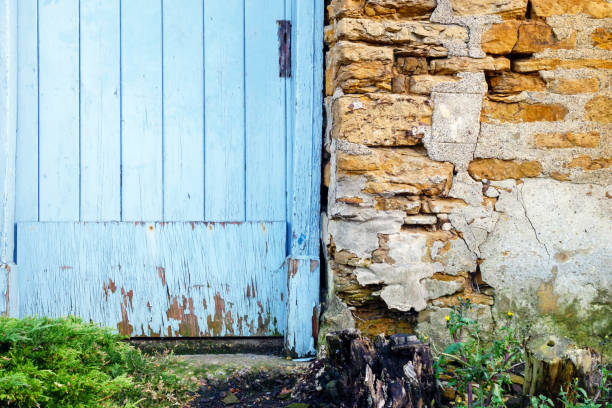 istock old door stone wall building texture in england uk 1211318320