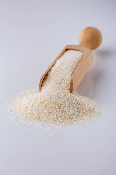 istock natural organic semolina on white acrylic background 1211318678