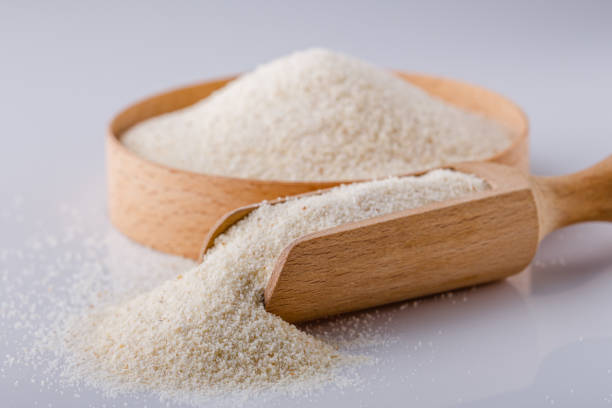 istock natural organic semolina on white acrylic background 1211318795
