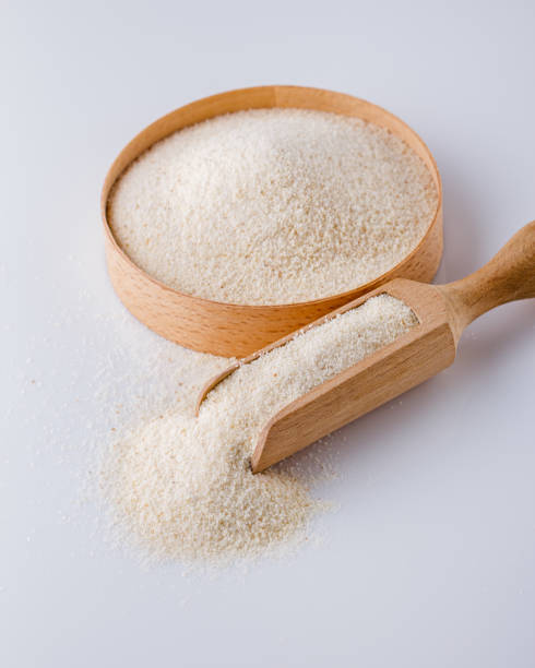 istock natural organic semolina on white acrylic background 1211319768