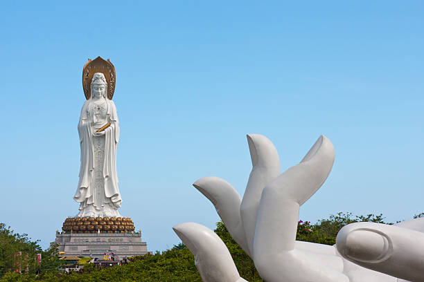 istock Buddhist lotus-shaped fingers and Quan Yin (goddess of mercy),China 121132041