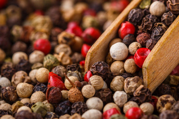 istock mix of peppercorns on white acrylic background 1211321462