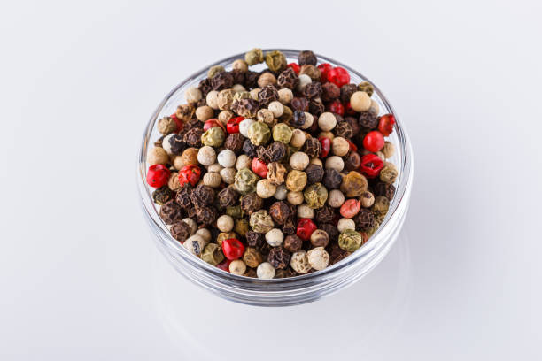 istock mix of peppercorns on white acrylic background 1211321500