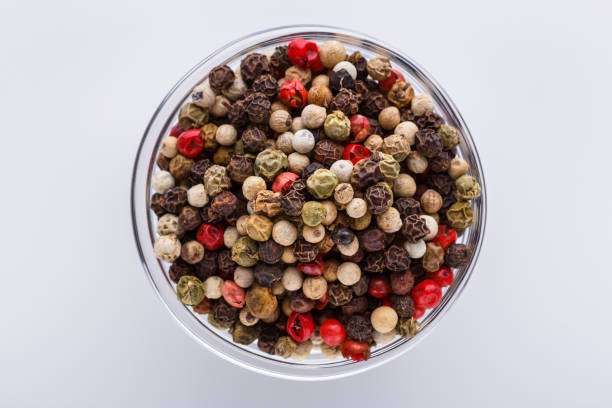 istock mix of peppercorns on white acrylic background 1211321549