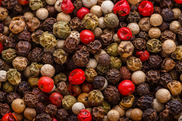 istock mix of peppercorns on white acrylic background 1211321712