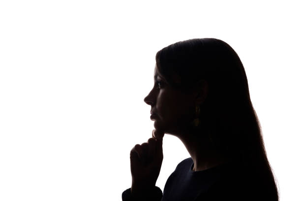 istock Portrait beautiful young girl looking up concept - silhouette, isolate 1211323075
