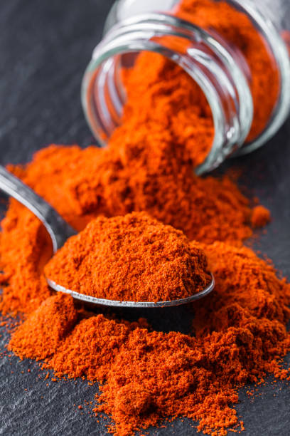 istock aromatic ground paprika on a dark stone background 1211323564