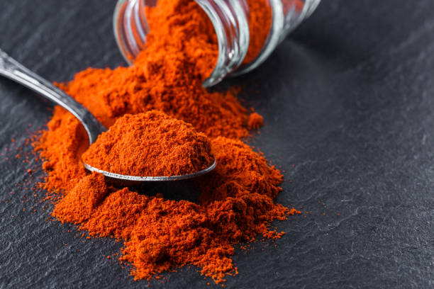 istock aromatic ground paprika on a dark stone background 1211324172
