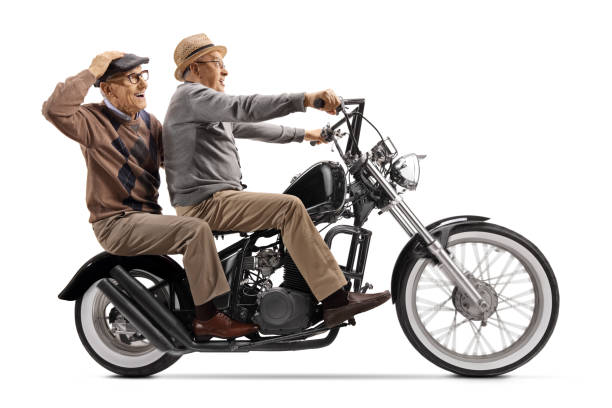 istock Senior men on a custom chopper motorcycle 1211324247