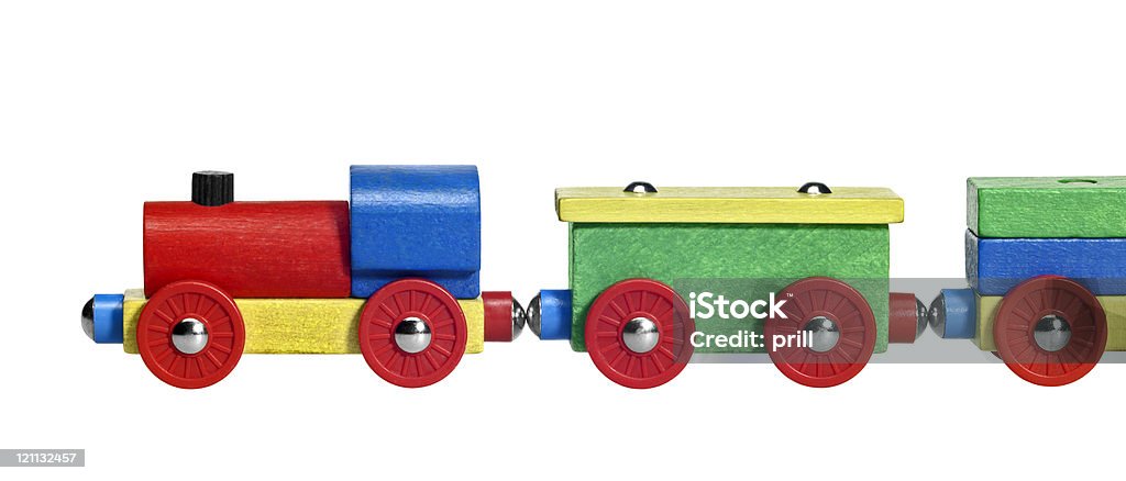 sideways wooden toy train studio photography of a colorful wooden toy train in white back Train Set Stock Photo