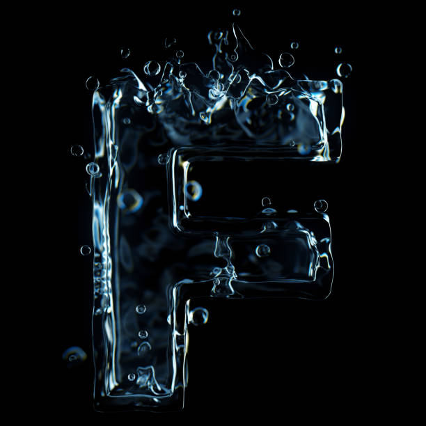 istock Liquid letter F water splash isolated on black background 1211325495