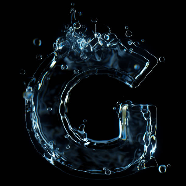 istock Liquid letter G water splash isolated on black background 1211325515