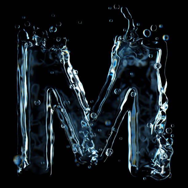 istock Liquid letter M water splash isolated on black background 1211325653