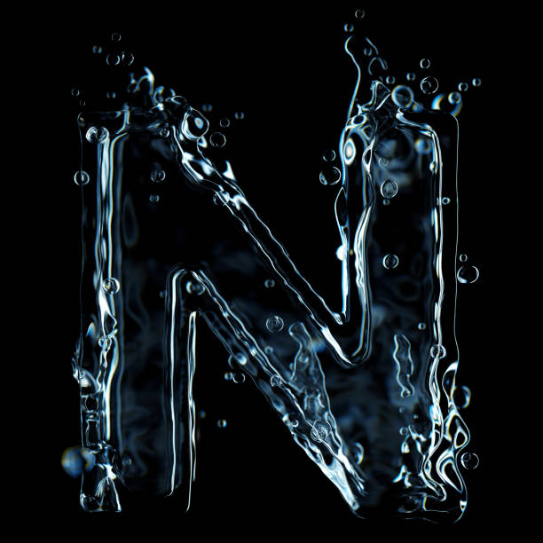 Liquid letter N water splash isolated on black background