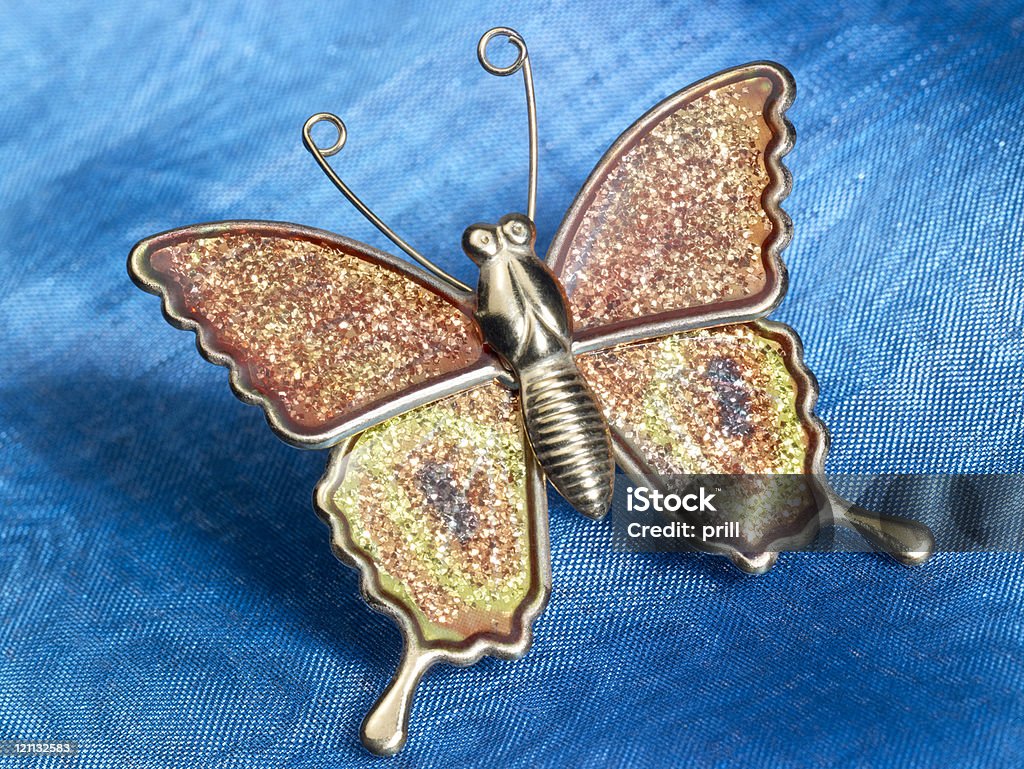 Papillon babioles sur les tissus bleu - Photo de Accessoire libre de droits