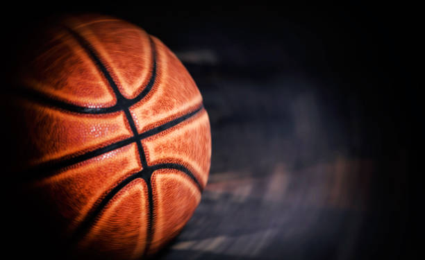 istock basketball ball on wooden background. 1211326242