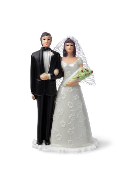 istock Bride and groom cake topper 1211326316