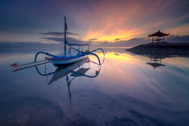 Tradotional boat and Gazebo at coral beach sanur bali