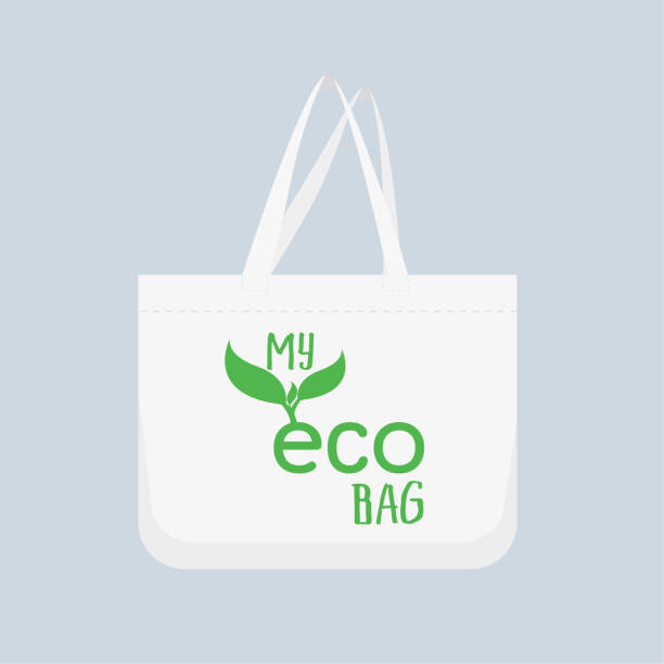istock Eco canvas bag. say no to plastic bags, refuse ban slogan and textile shopping handbag illustration 1211331761