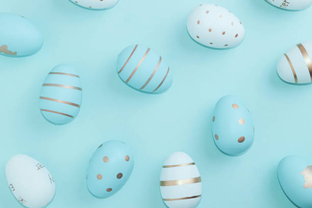 istock Easter background with Easter eggs in bird nest on blue background 1211332706