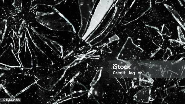 Cracked glass texture on black background. Smashed glass object with  shards. Broken glass fragments on black wallpaper. Abstract shattered glass  concept. AI Generated 31426174 Stock Photo at Vecteezy