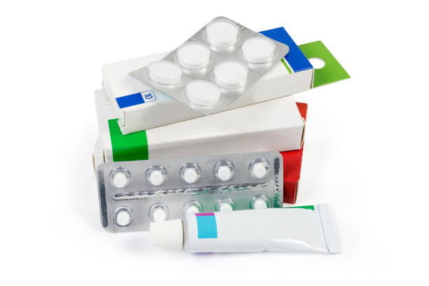 boxes, tube and blister packs with medical products - blister pack pill medicine healthcare and medicine imagens e fotografias de stock