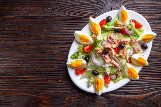 istock tuna salad on dark wooden rustic background 1211336617
