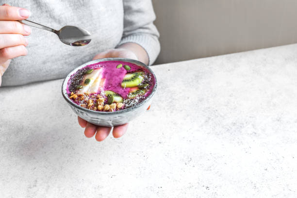 istock Eating healthy smoothie bowl 1211337201